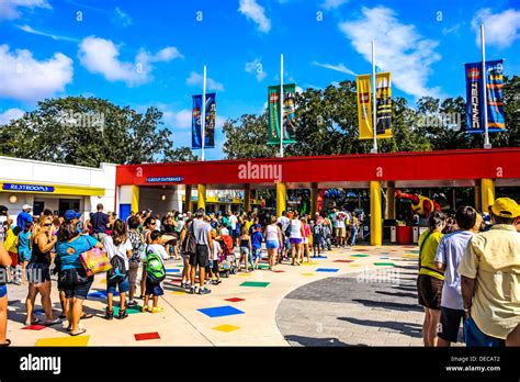 People line up at the entrance to Legoland Florida Theme Park for a day ...