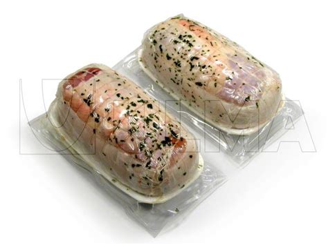 Chicken Fillets Vacuum Packaging In Thermoforming In Flexible Film