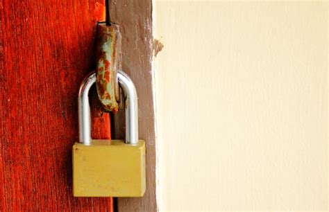 Premium Photo | Close-up of padlock on door