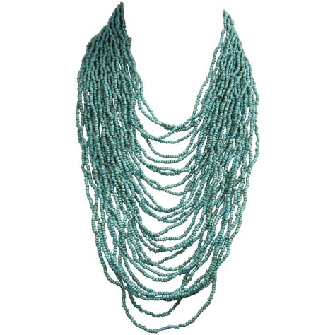 Native American Seed Bead Turquoise 28 Strand Bib Necklace At 1stdibs Native American Seed