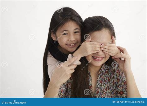 Mother And Daughter Playing Peek A Boo Stock Image Image Of Charming