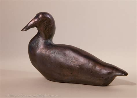 Bronze Duck - Small stylized bronze duck sculpture