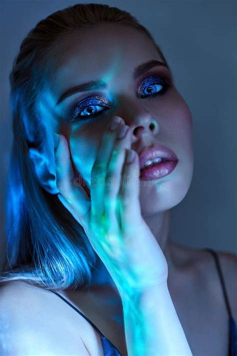 Woman With Wet Hair And Bright Makeup Posing Near The Water Portrait