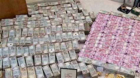 Noida I T Raids On Ex Ips Officer Boxes Of Cash Worth Several Crores Found