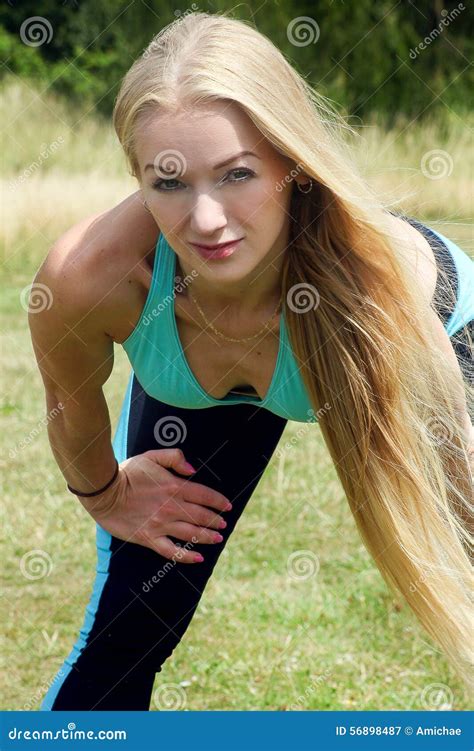Cute Blonde Woman Relaxing After Doing A Workout In The Park Stock Image Image Of Fitness