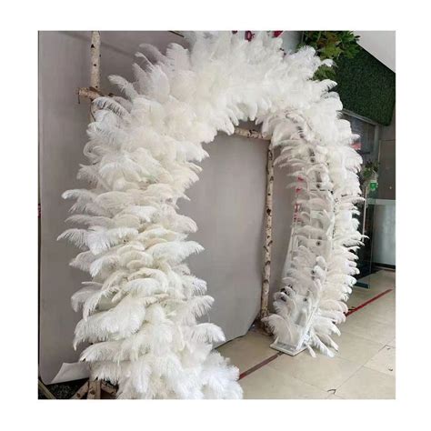 A White Wreath Made Out Of Fake Feathers