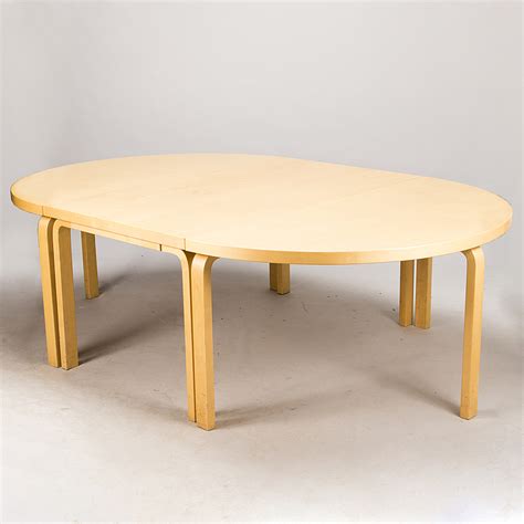 ALVAR AALTO A Late 20th Century Set Of Three Tables Model 82A And