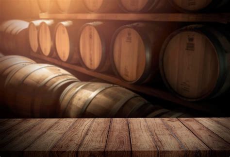 Premium Photo A Row Of Barrels In A Wine Cellar With The Word Wine On