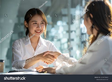 success business people shake hands  stock photo