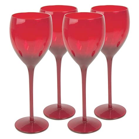 Three Red Wine Glasses Sitting Next To Each Other