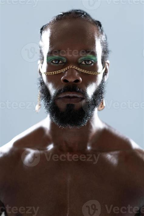 Serious African American Shirtless Gay Model With Blue Eye Makeup Stock Photo At Vecteezy