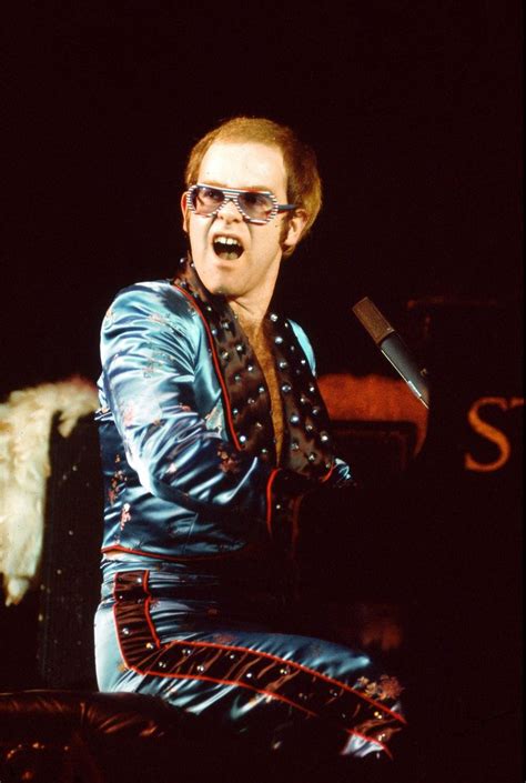 How Elton John Developed His Singular Flashy Style Elton John Young Elton John Elton John