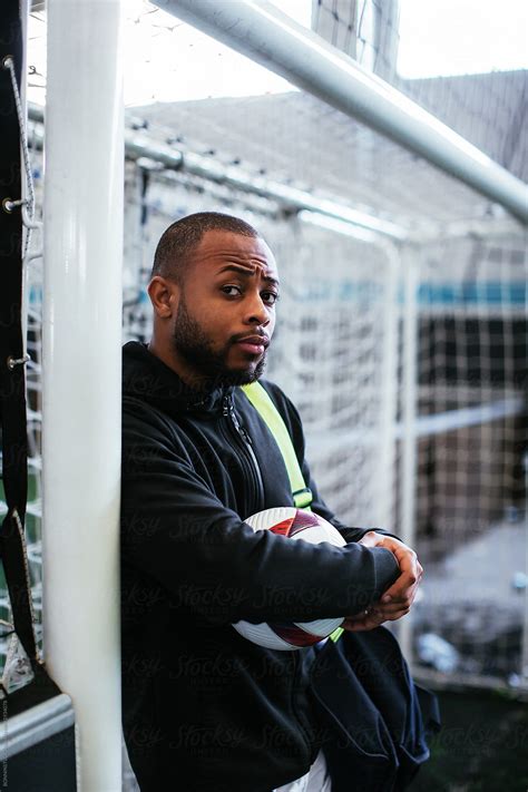 African Soccer Player In Indoor Football Field Del Colaborador De