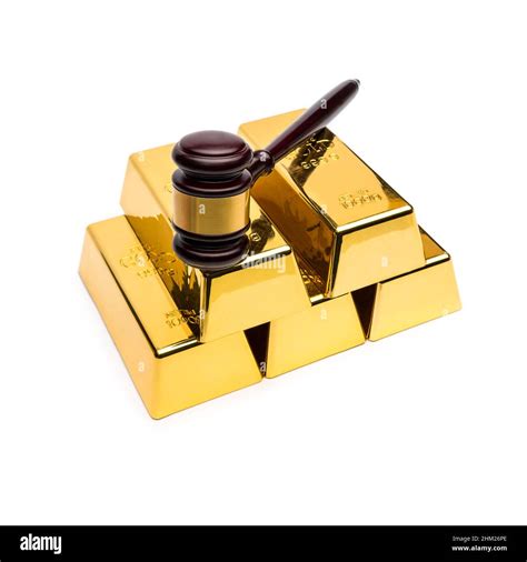 gold bars with auction gavel Stock Photo - Alamy