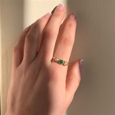 Emerald And Pearl Trilogy Ring Chique To Antique Jewellery