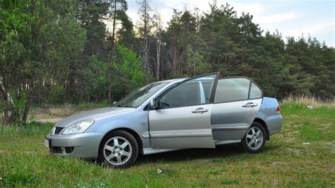 Стуки в подвеске Mitsubishi Lancer IX 1 6 л 2006 года визит на