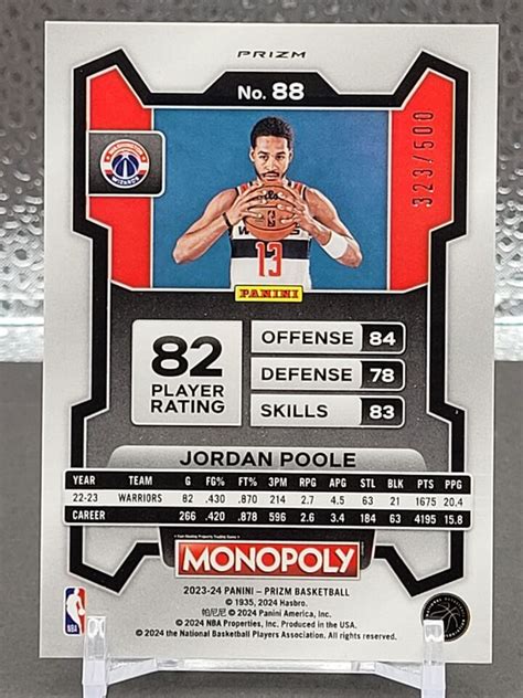 Jordan Poole Prizm Monopoly Gold Mojo Washington Wizards