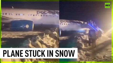 Airplane Skids Off Runway Gets Stuck In Snow