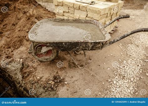 Concrete in a Wheelbarrow at a Construction Site Stock Image - Image of industry, mason: 139442599