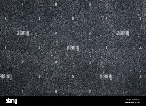 old dark tar paper background Stock Photo - Alamy