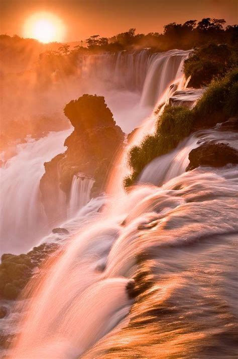 Sunset over Iguazu Falls in Brazil. - Farmington Hills Inn