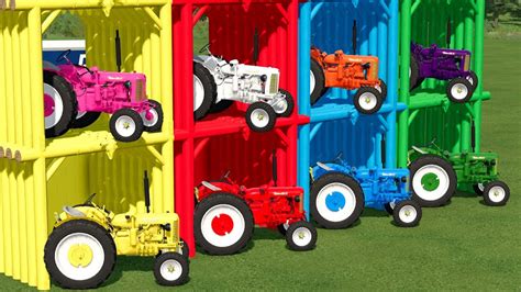 MINI TRACTORS OF COLORS TRANSPORTING ZETOR TRACTORS TO THE GARAGE