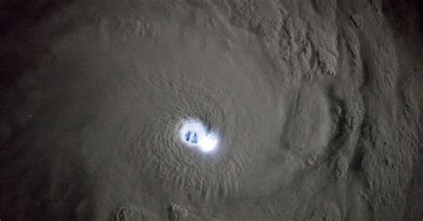 The electric eye of a cyclone, viewed from space - CNET