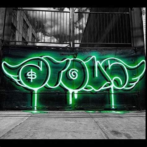 A Black And White Photo With Green Neon Lights In The Shape Of Letters