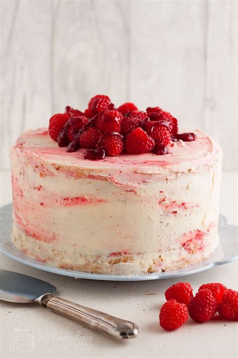 Three Layers Of Lemon Cake Sandwiched Together With Raspberry Jam And