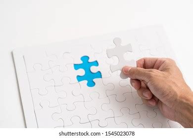 Hand Holding Jigsaw Piece Business Concept Stock Photo Edit Now