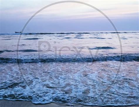 Image Of This Photo Of A Deep Blue Moonlit Ocean At Night With Calm