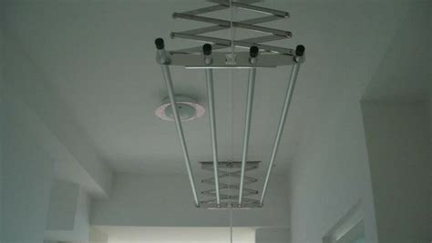 Laundry retractable clothes line/rack ... attached to ceiling instead ...