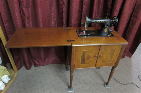 Lot Detail Vintage Knee Operated Singer Sewing Machine In Cabinet