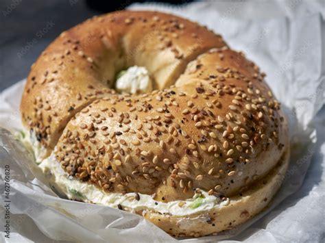 An Everything Bagel With Scallion Cream Cheese Served In Queens County