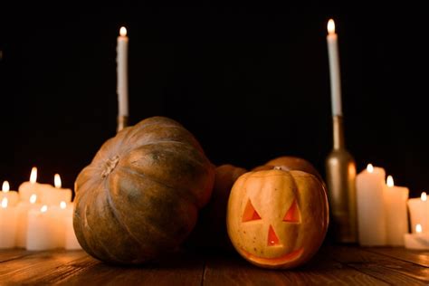 Premium Photo | Halloween pumpkin with candles