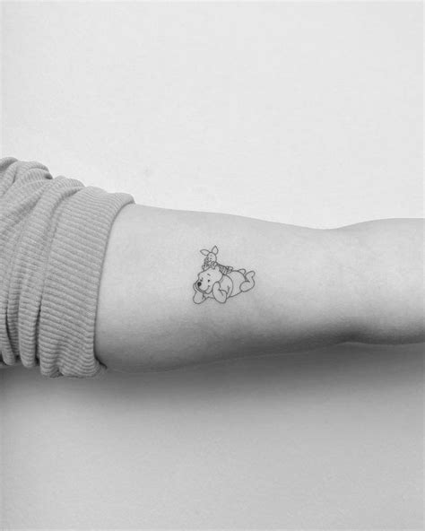 Winnie The Pooh And Piglet Tattoo On The Inner Arm