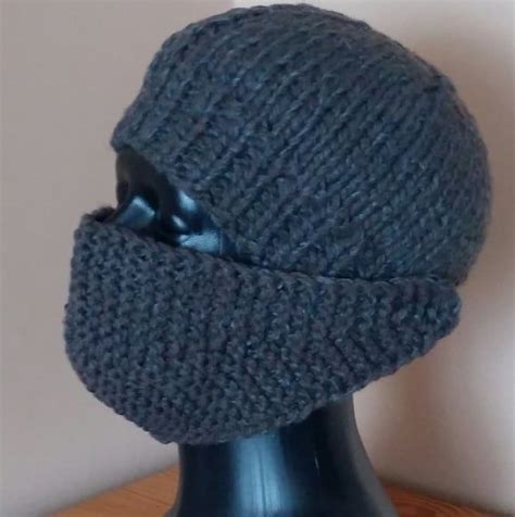 A Knitted Hat Is Sitting On Top Of A Mannequin S Head