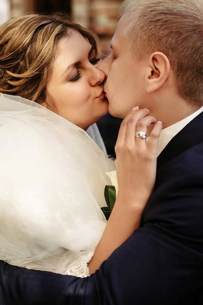 Premium Photo Happy Gorgeous Blonde Bride And Stylish Handsome Groom Hugging With True