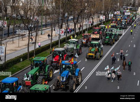 Farmers And Tractors Protesting Marching Through The City Center