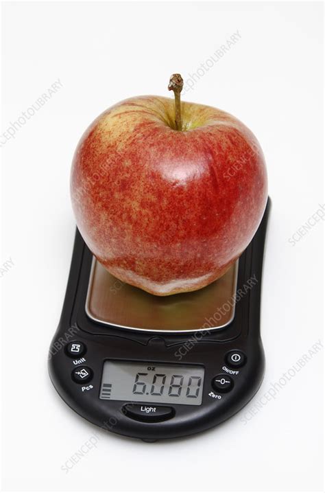 Apple Weight In Ounces Stock Image C022 0650 Science Photo Library