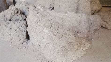 Gritty Sand Cement Chunks And Cylinder Crumble In Water Dry