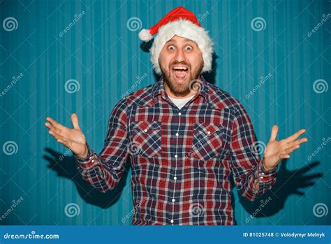 Smiling Christmas Man Wearing A Santa Hat Stock Photo Image Of Person