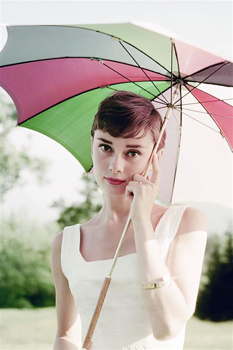 Holding An Umbrella Of Audrey Hepburn NUDE CelebrityNakeds