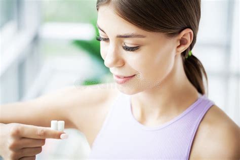 Beautiful Young Woman Eating Chewing Gum Smiling Stock Image Image