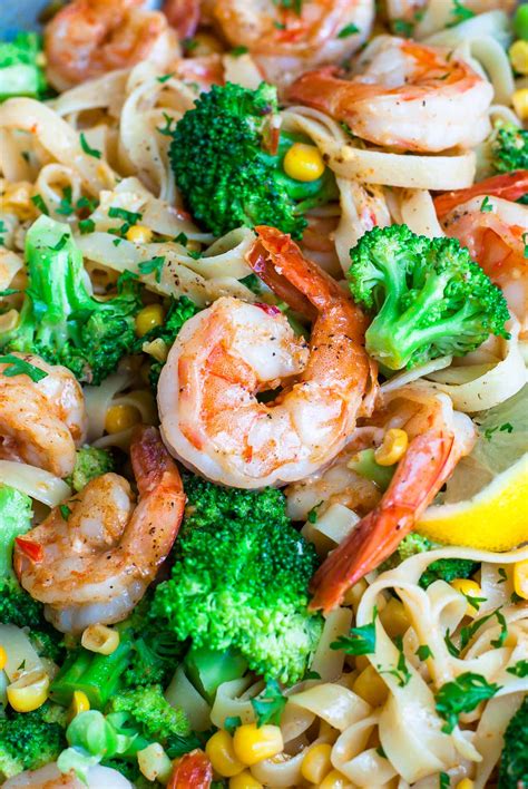 Cajun Shrimp Pasta With Lemon And Veggies Peas And Crayons