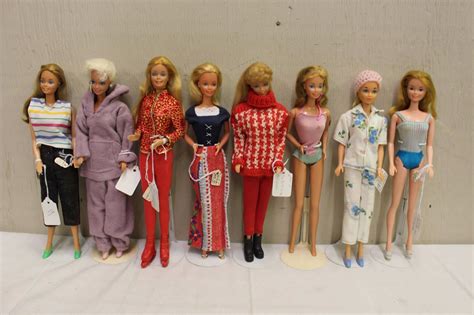 Lot of 1960's Barbie Dolls (8)w/Stands