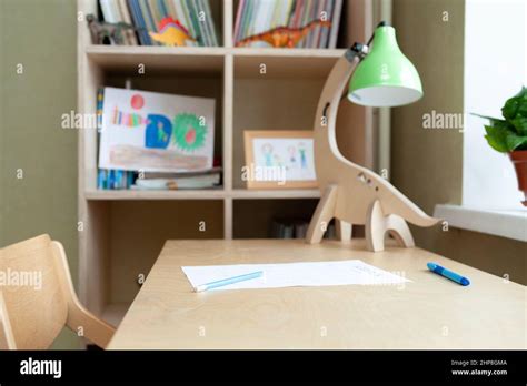 Desk With Sheet Of Paper With Math Test In The Children Room Stock