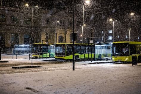 Premium Photo Three Buses At Bus Stop In Front Of Reconstructed Lviv