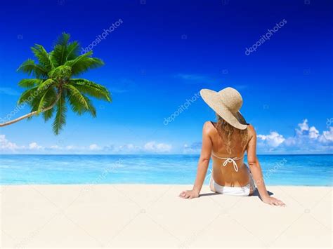 Woman relaxing on beach — Stock Photo © Rawpixel #52467191