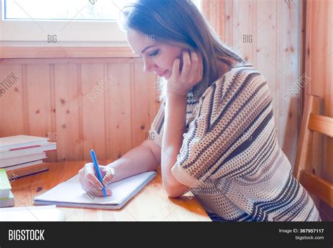 Woman Writing A Book